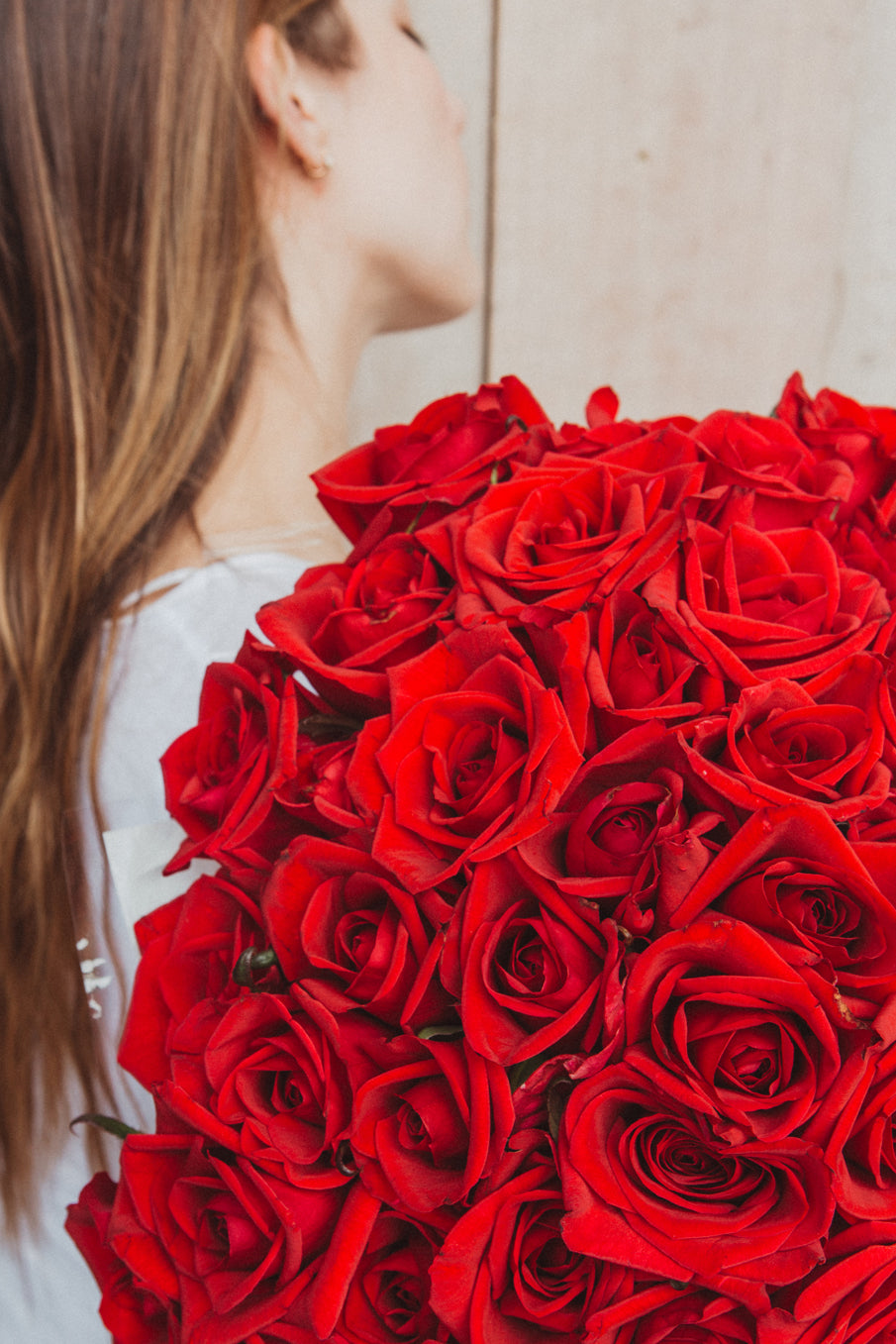 Carola, ramo de rosas rojas.